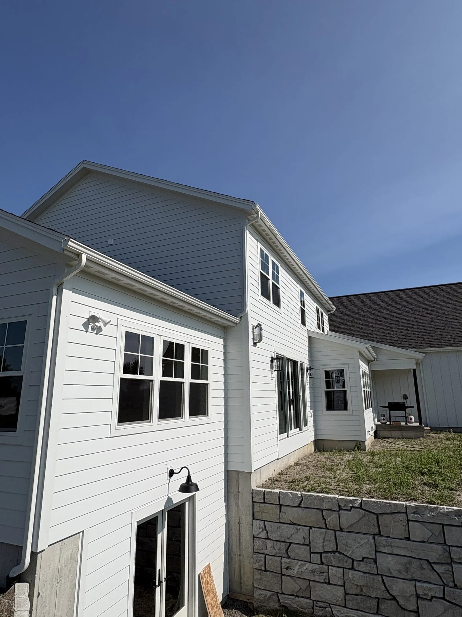 Siding with stone accents on a custom home